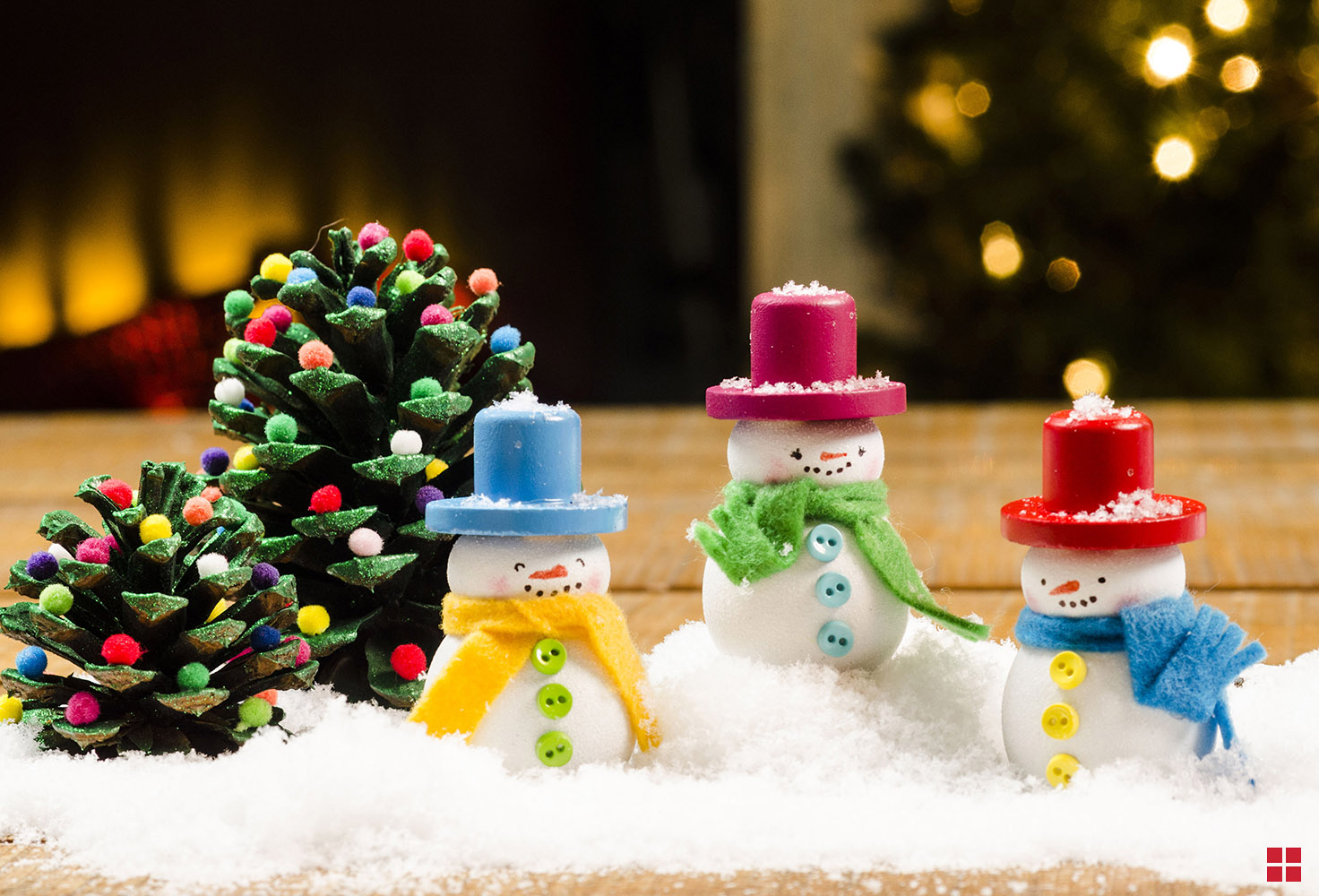 Three wood painted snowmen. 