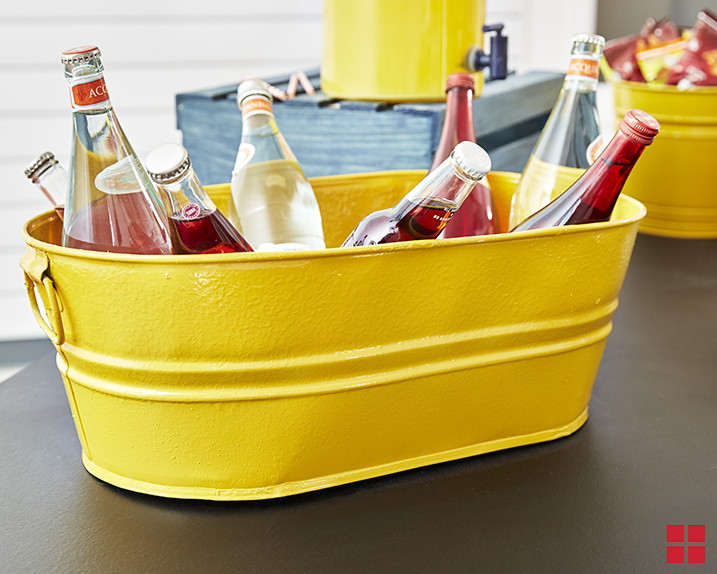 Metal drink tub spray painted with Rust-Oleum Stops Rust Protective Enamel in Gloss Tuscan Sun.