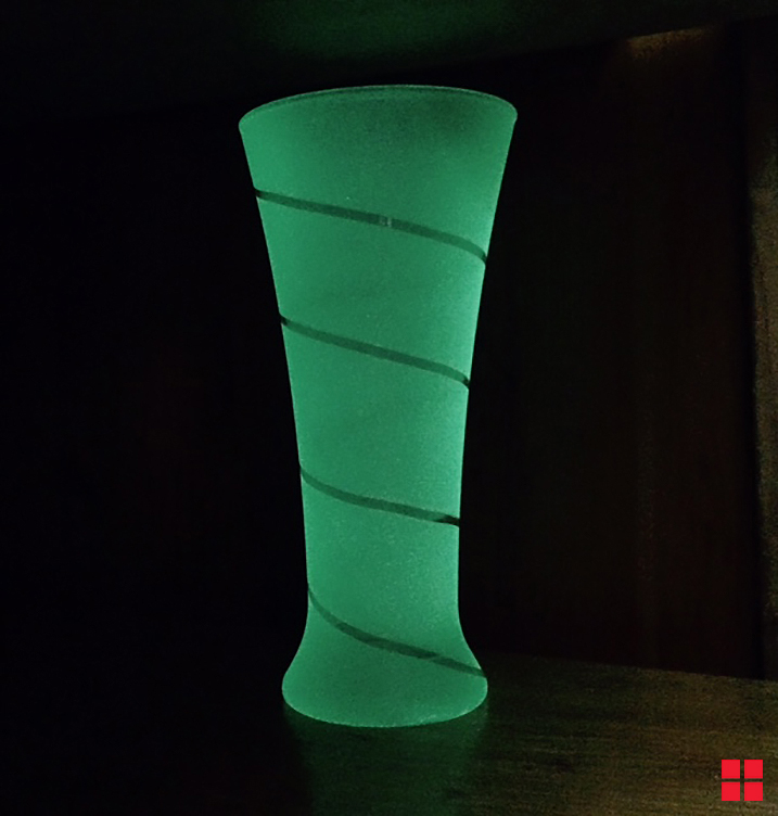 Glowing vase sprayed with glow in the dark paint