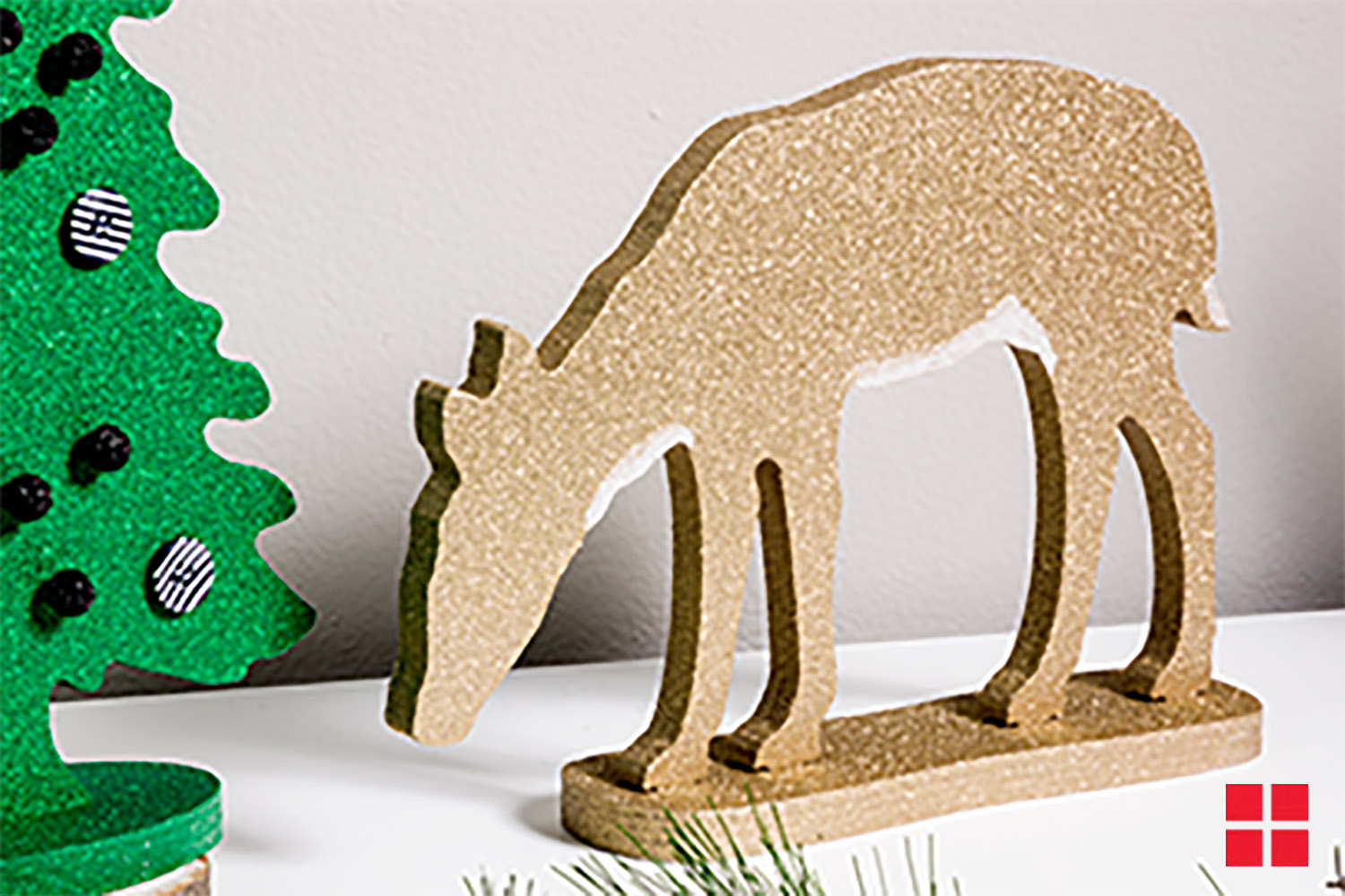 Glittery gold reindeer décor. 