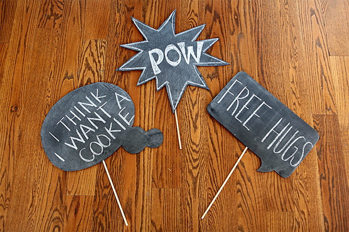 Comic book style word bubbles made out of wood and spray painted with Chalkboard paint. 