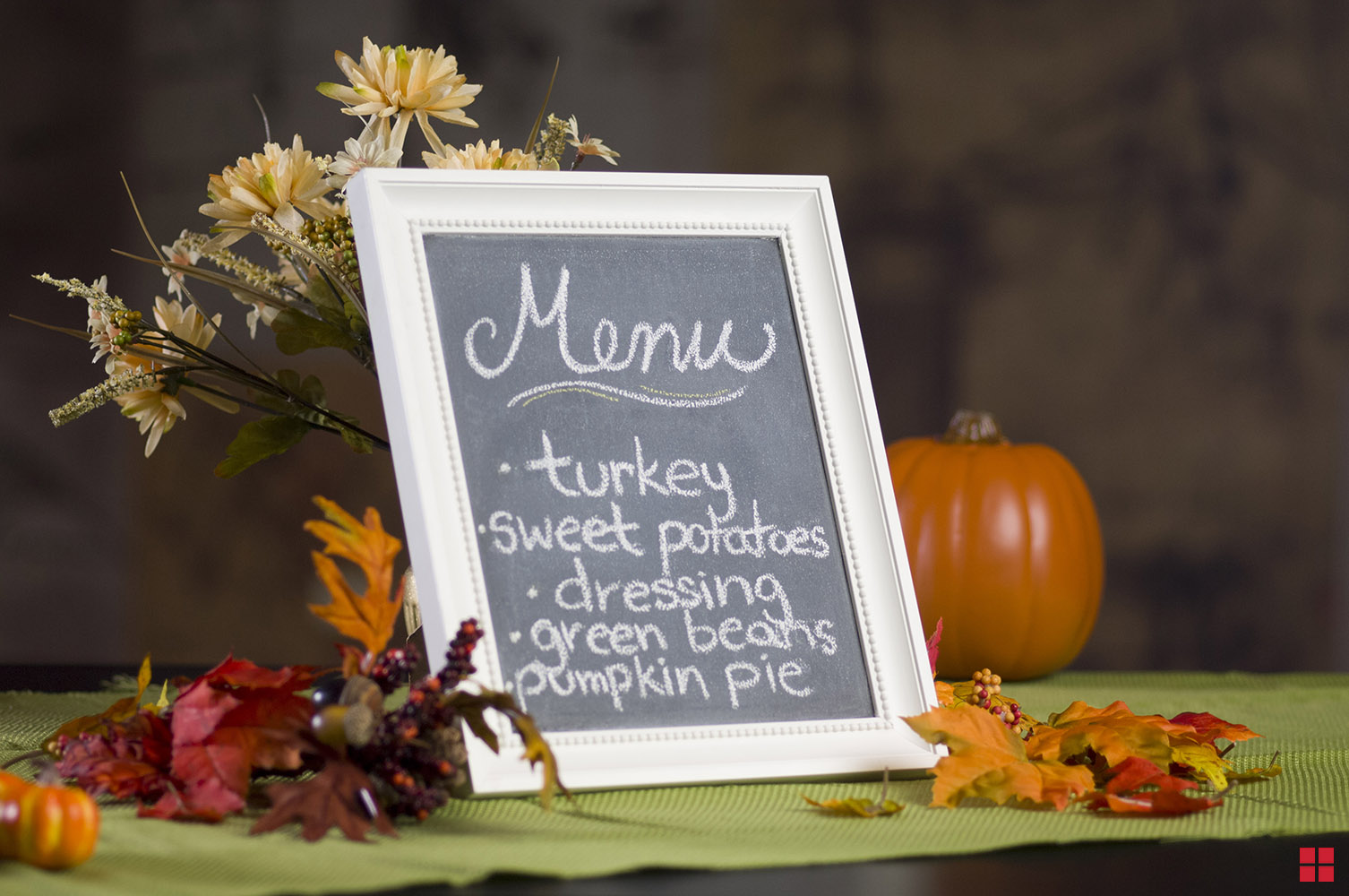 Chalkboard menu featuring Thanksgiving dishes.