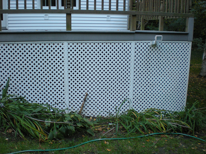Fencing and lattice covered with dirt