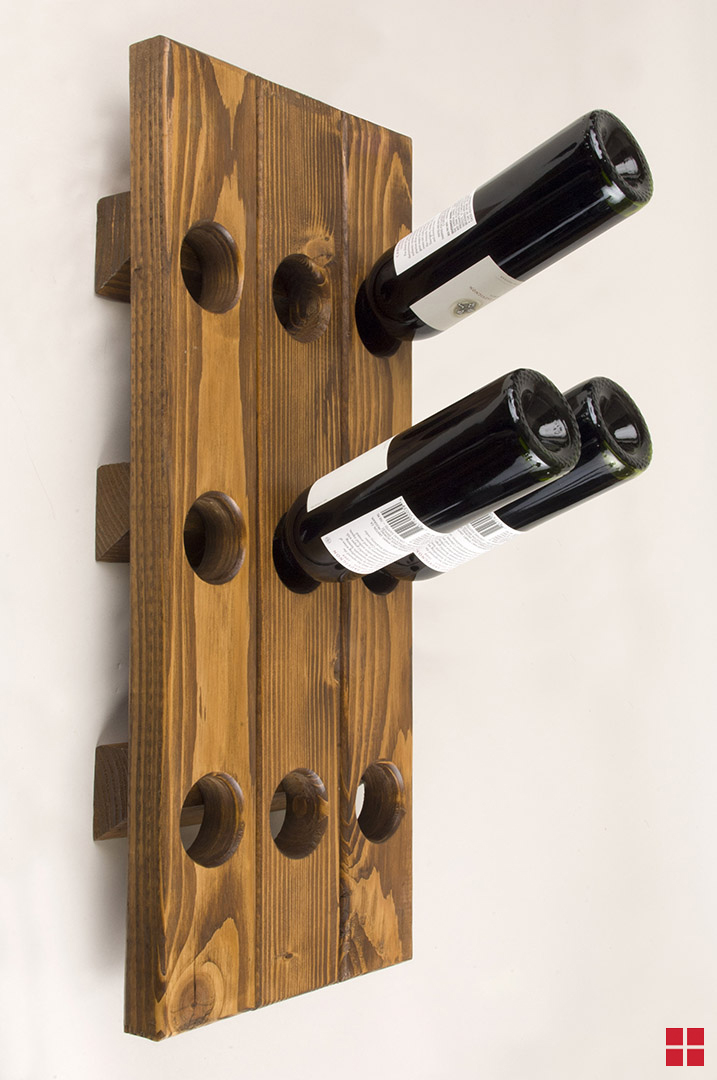 Stained wood wine rack mounted on a wall. 