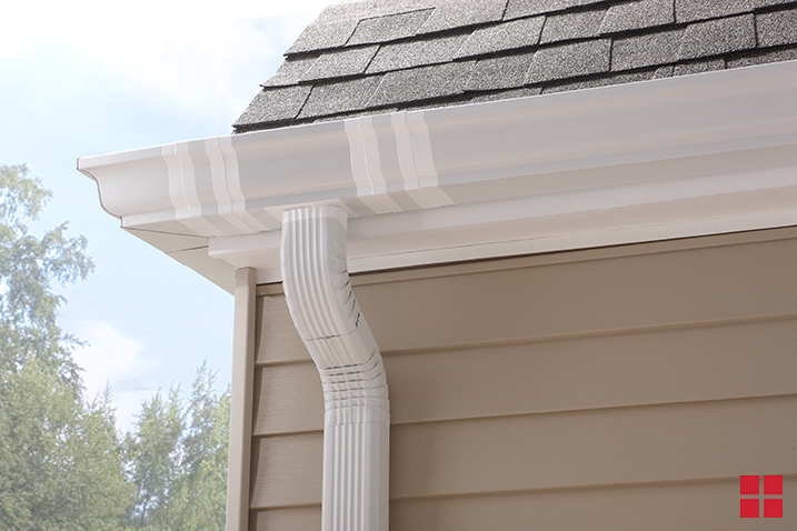 Gutters painted with white LeakSeal paint