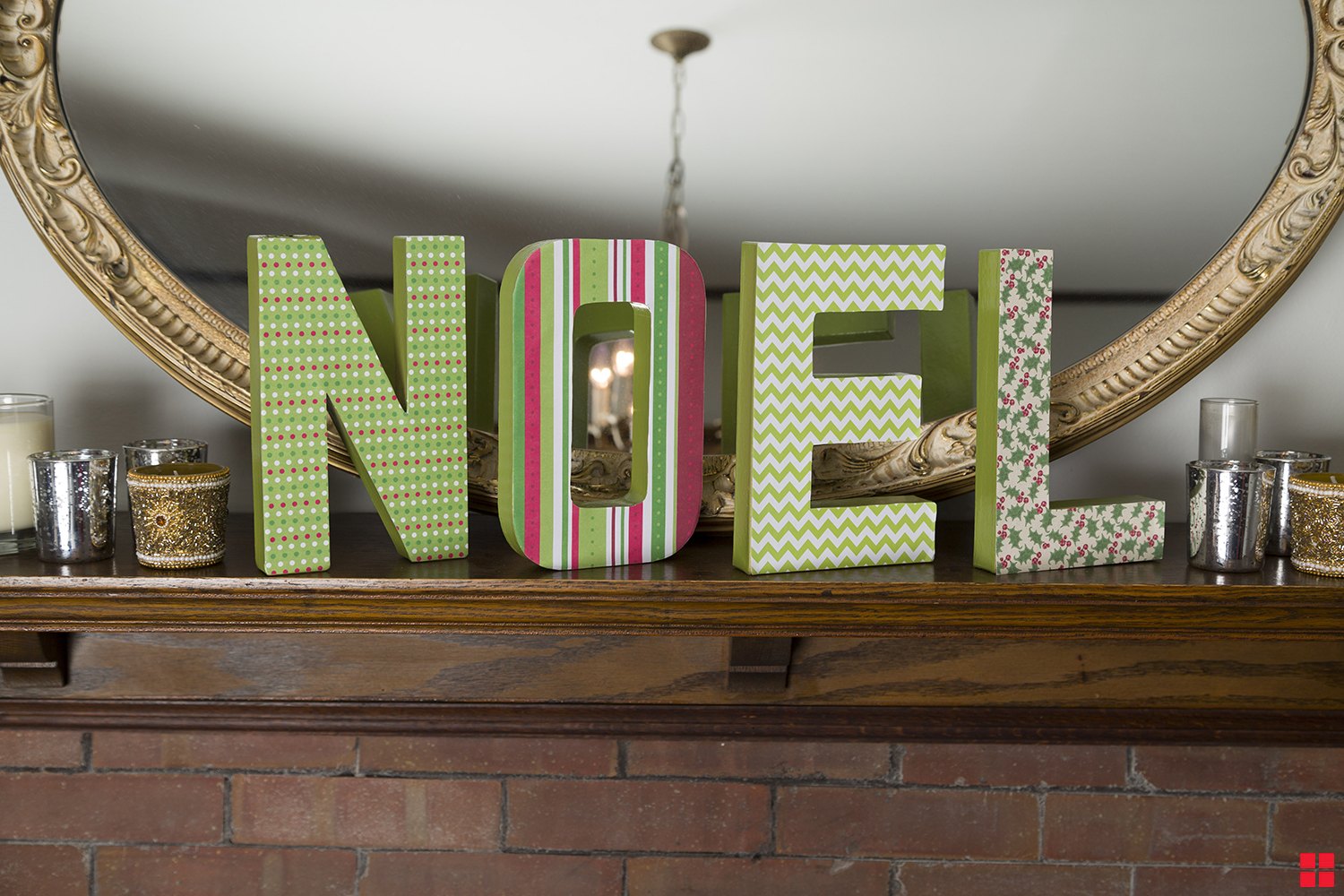 Decorated block letters that spell “Noel.”
