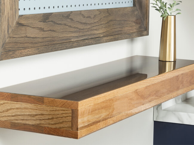 Floating Shelf Hanging On Wall With A Vase On It