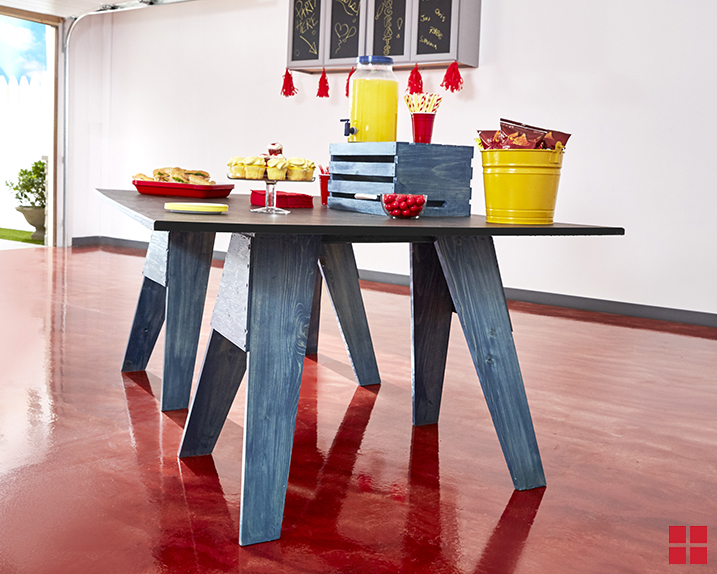 Sawhorse table stained with Varathane stain and table top coated with Specialty Chalkboard paint